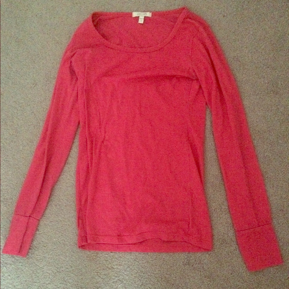 Pink Delia’s shirt.